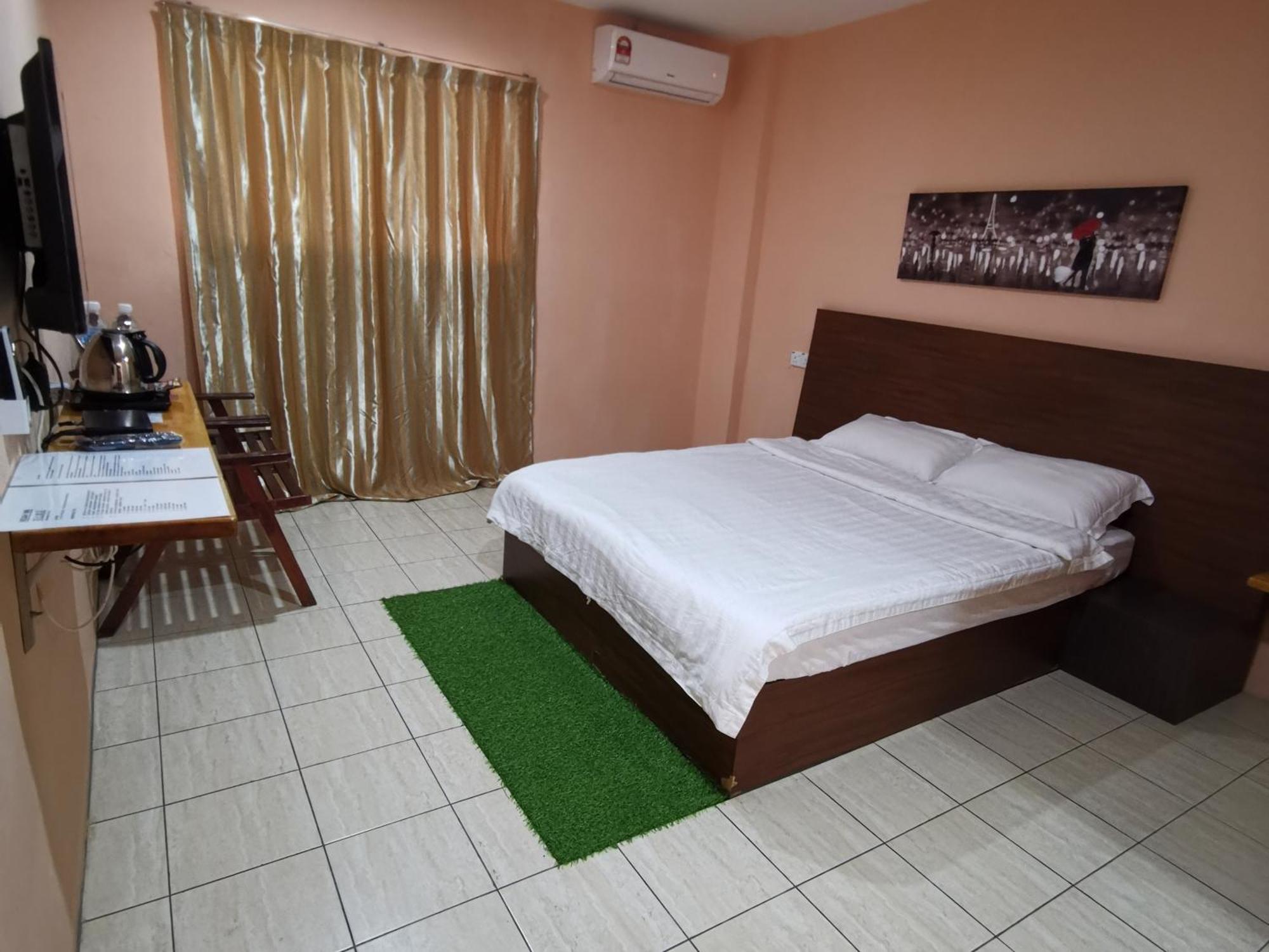Indah Inn タワウ 部屋 写真